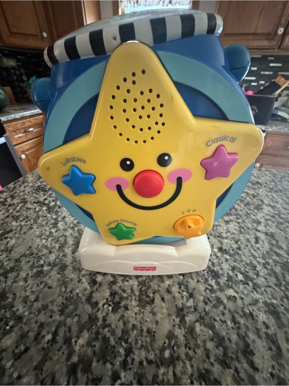 Fisher-Price Yellow Star Musical Toy with Blue Drum and Colorful Buttons